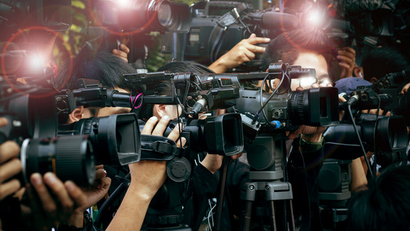 press and media camera ,video photographer on duty in public new