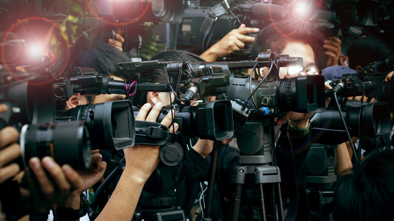 press and media camera ,video photographer on duty in public new